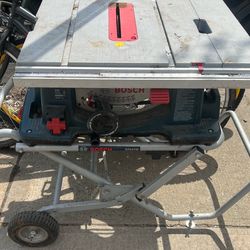 Bosch 4100-series 10-inch worksite table saw mounted on a Gravity-Rise wheeled stand