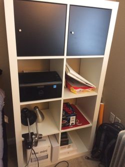 Two IKEA cube shelves: one 2x2, and one 4x2.