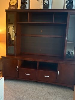 Large solid-wood entertainment center / TV cabinet with storage