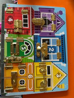Melissa and Doug lock board puzzle