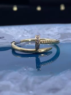 $550 Yellow Gold Zirconia Twisted Nail Ring