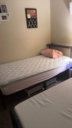 Twin bed frame and mattress