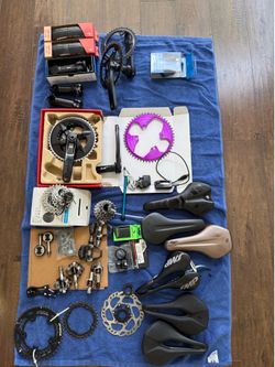 Bike parts - crankset - pedals - tires - chargers - seats