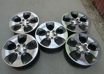 5 2014 Jeep Wrangler rims 18x7.