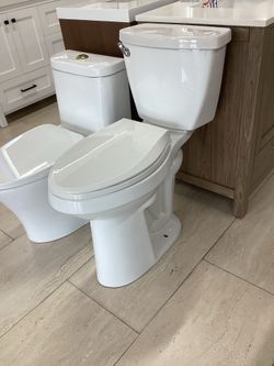 21” h toilet new white color sink flush with Softclose seat standard installation extra tall elongated bowl powerful flush ready for pick up today