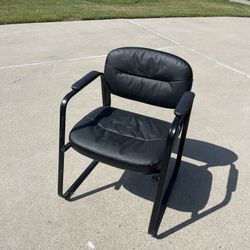 Cushioned Black Metal Chair