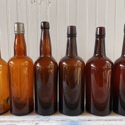 Antique Amber glass bottles cork top