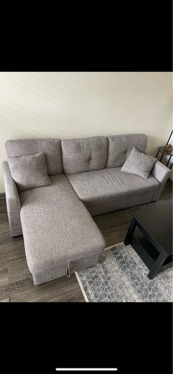 Sectional sofa with pull out