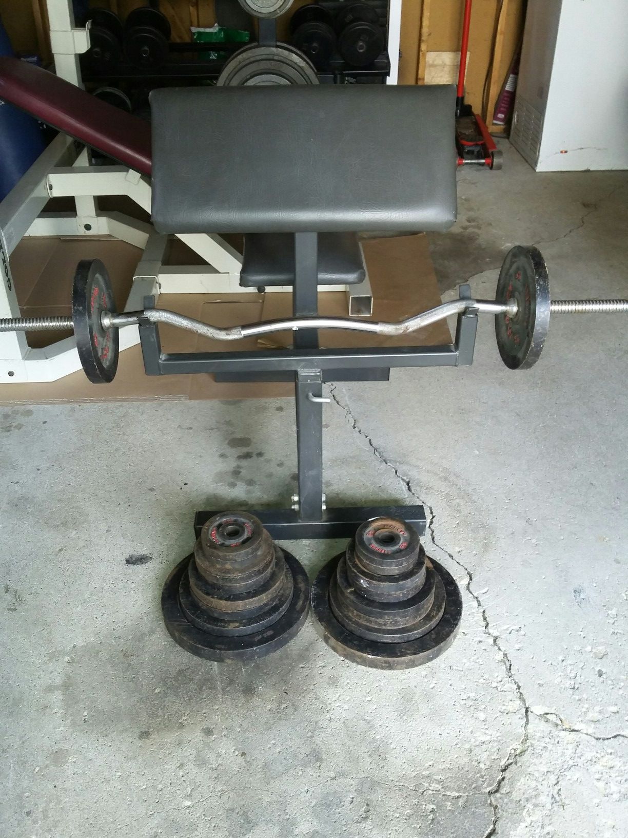 Curling bench (preacher bench) curling bar clamps and 150 pounds of weights