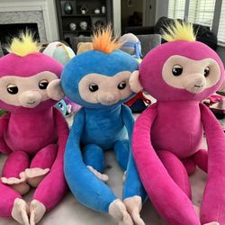 Three super cute monkey toys