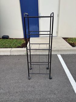 Metal shelf on the wheels