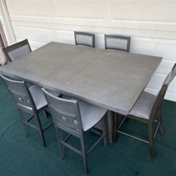 7-PC SLEEK GRAY FINISH RUSTIC HIGH TOP DINING SET (TABLE WITH EXTENSION LEAF AND 6 PADDED CHAIRS)