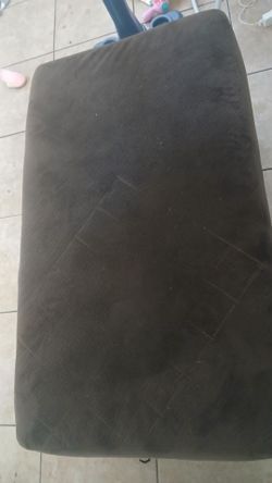 Soft brown couch with hide spot
