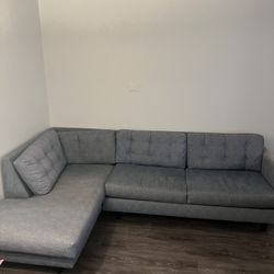 Blue L shape, couch