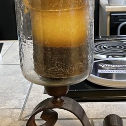 Candle holder with candle