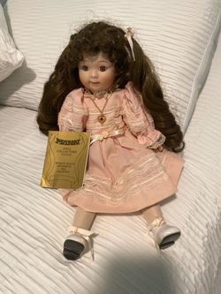 Seymour Mann porcelain musical doll