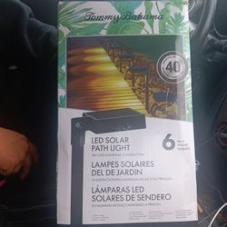  6-pack of Tommy Bahama 40-Lumen Solar LED Path Lights. 