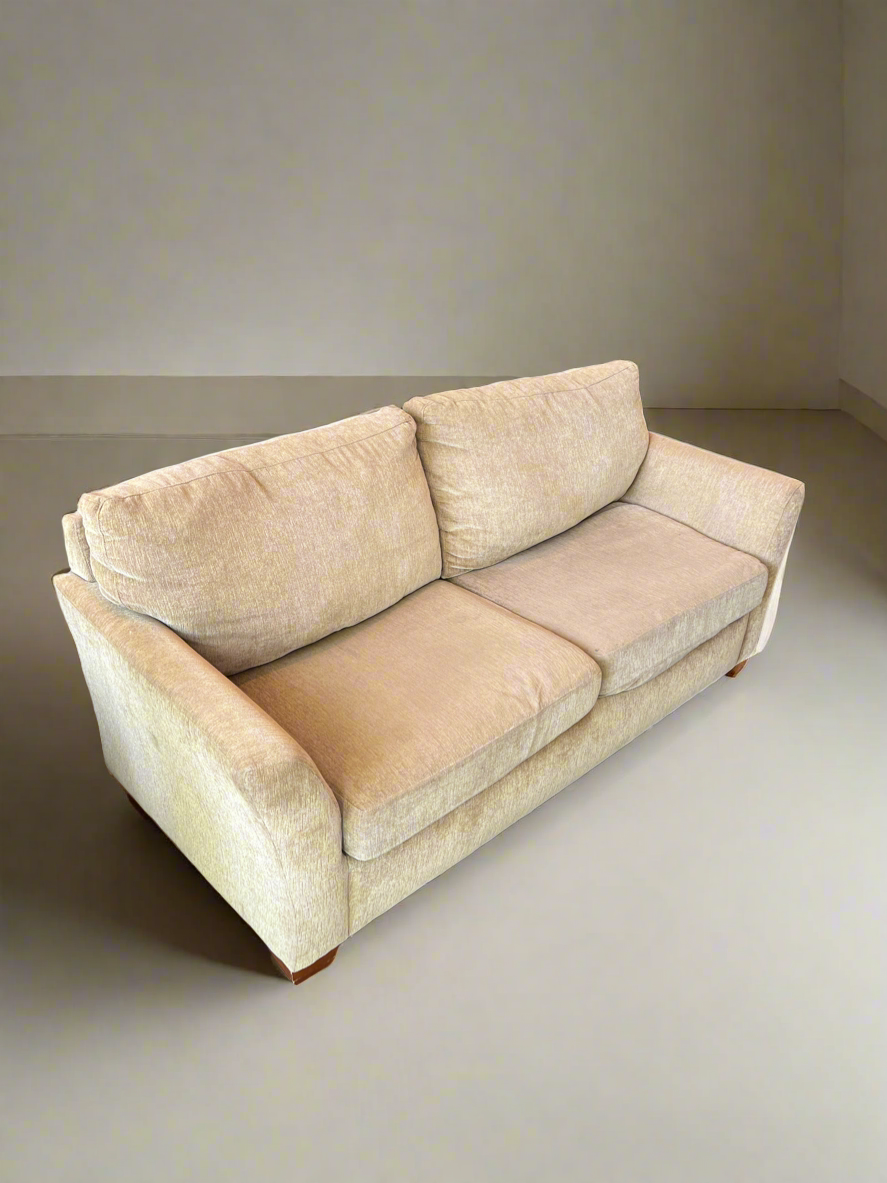 Tan Two Seat Sofa With Two Cushions - Rip in Upper Part of Couch - Price Reflects Damage