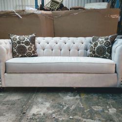 Tufted sofa and loveseat off white fabric bronze nail on arms gold crystals