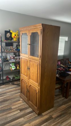 Wooden cabinet with display