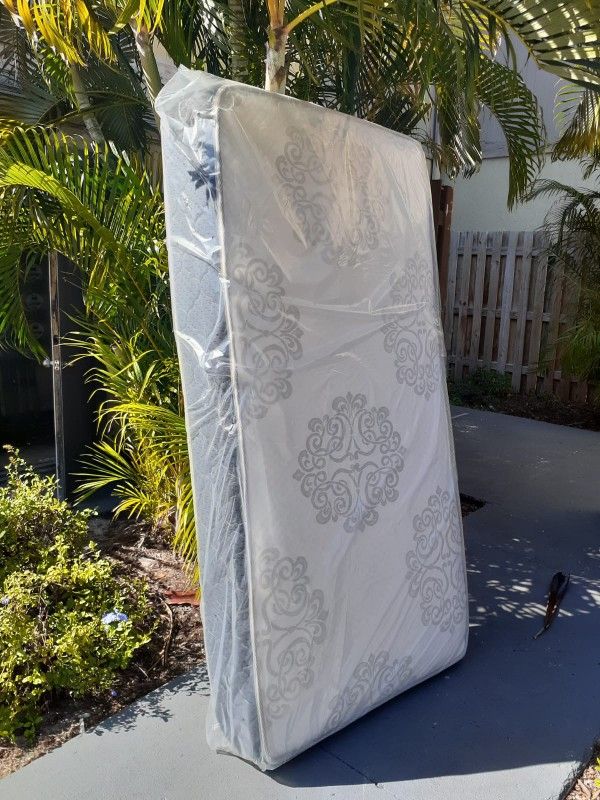 New TWIN size mattress & BOX spring. Bed frame not included on offer