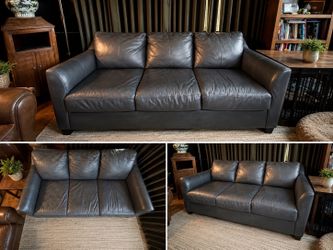 Blue/grey leather sofa.