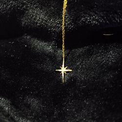 Gold star necklace