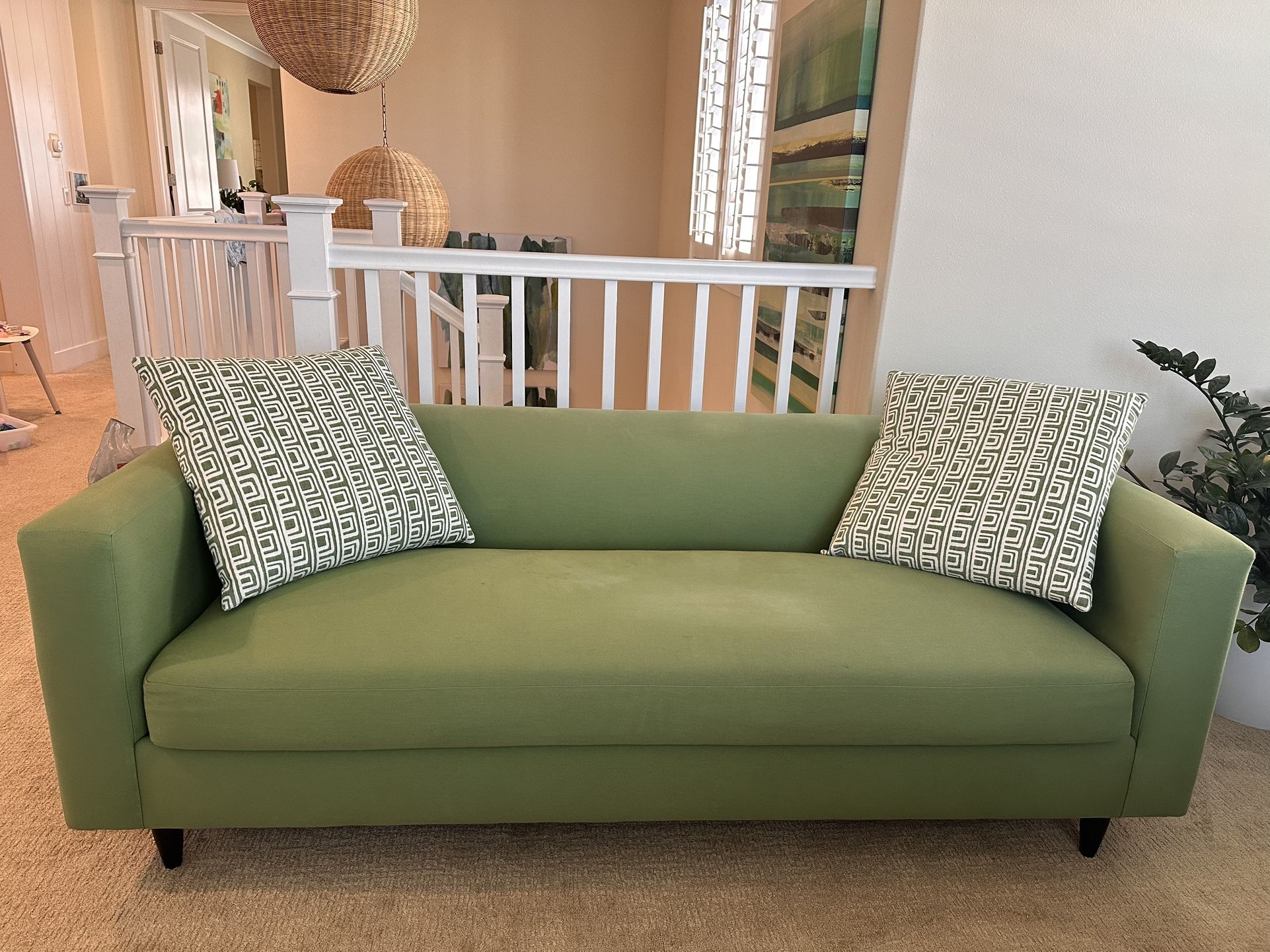Green Sofa With Pillows