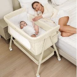 NEW Baby Bedside Bassinet Sleeper with Breathable Mesh, Lockable Wheels, Adjustable Height, Mattress New, Open Box Manufacturer calls this beige