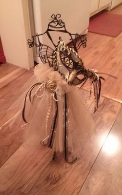 Wire dress and mask decor