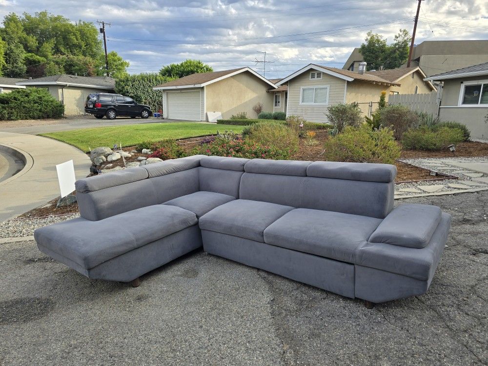 Delivery Available! Gray Sectional Couch Sofa Chaise Foot Rest Ottoman Bed Mattress Futon Pull Out. Good condition. Gently used, shows normal signs of