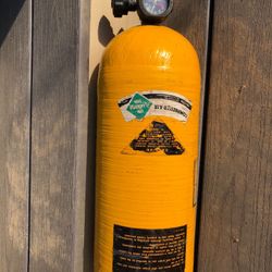 Compressed air tank about 20”long and about 7”diameter