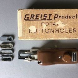 Greist Products Rotary Buttonholer box with a Kenmore branded sewing machine button hole attachment