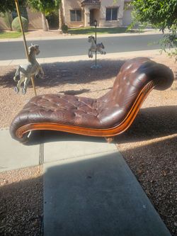 Brown leather chaise