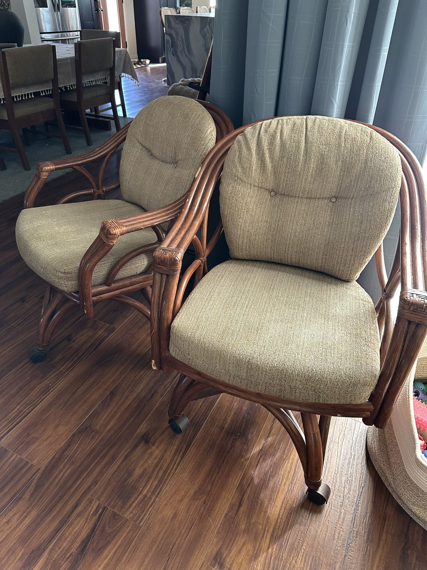 Pair Of Vintage Rattan Rolling Chairs