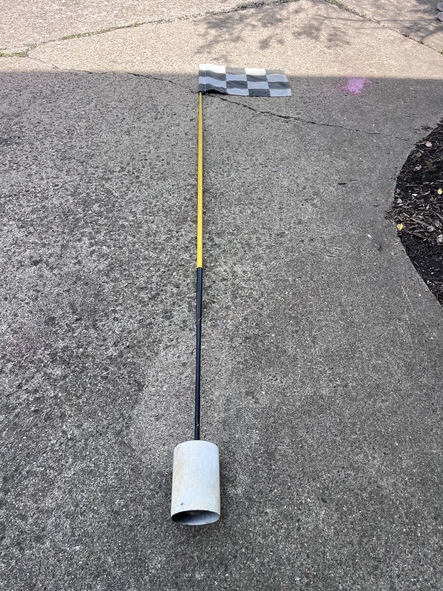 Golf flagstick and cup
