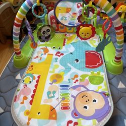 Fisher-Price Deluxe Kick and Play Piano