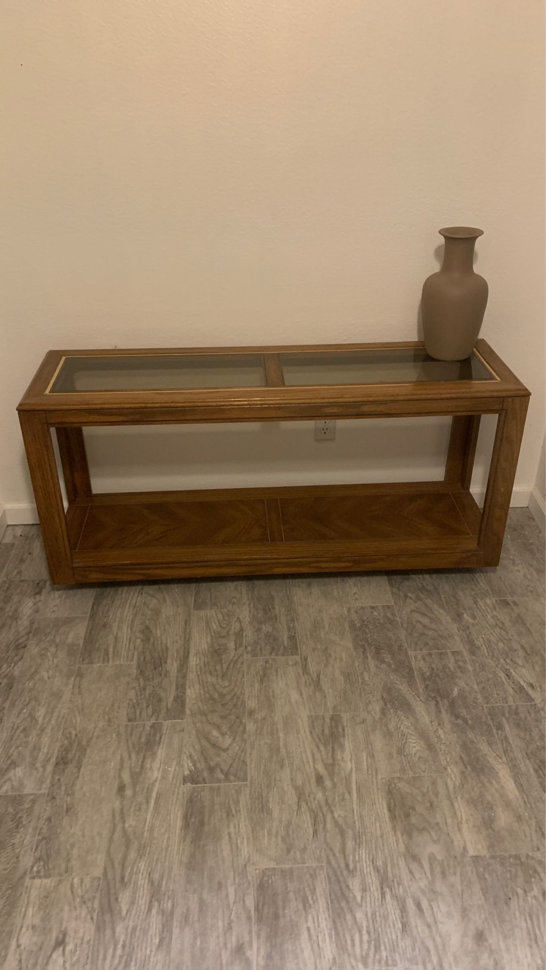 Console/Sofa table wood. Great condition. 54”Wide X 26” High X 16” Deep. Double glass top. No longer need it. Redecorating and doesn’t match new fu