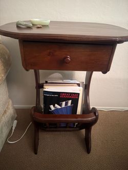 Wooden side table with drawer