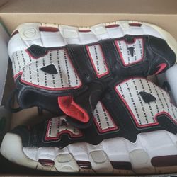 Nike Air More Uptempo "Pinstripe" shoes in a black, white, and university red colorway.