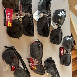 Assortment of sunglasses and glasses