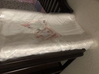 This is a gently loved baby crib with brand new unopened mattress. Am also including a changing pad brand new unopened.