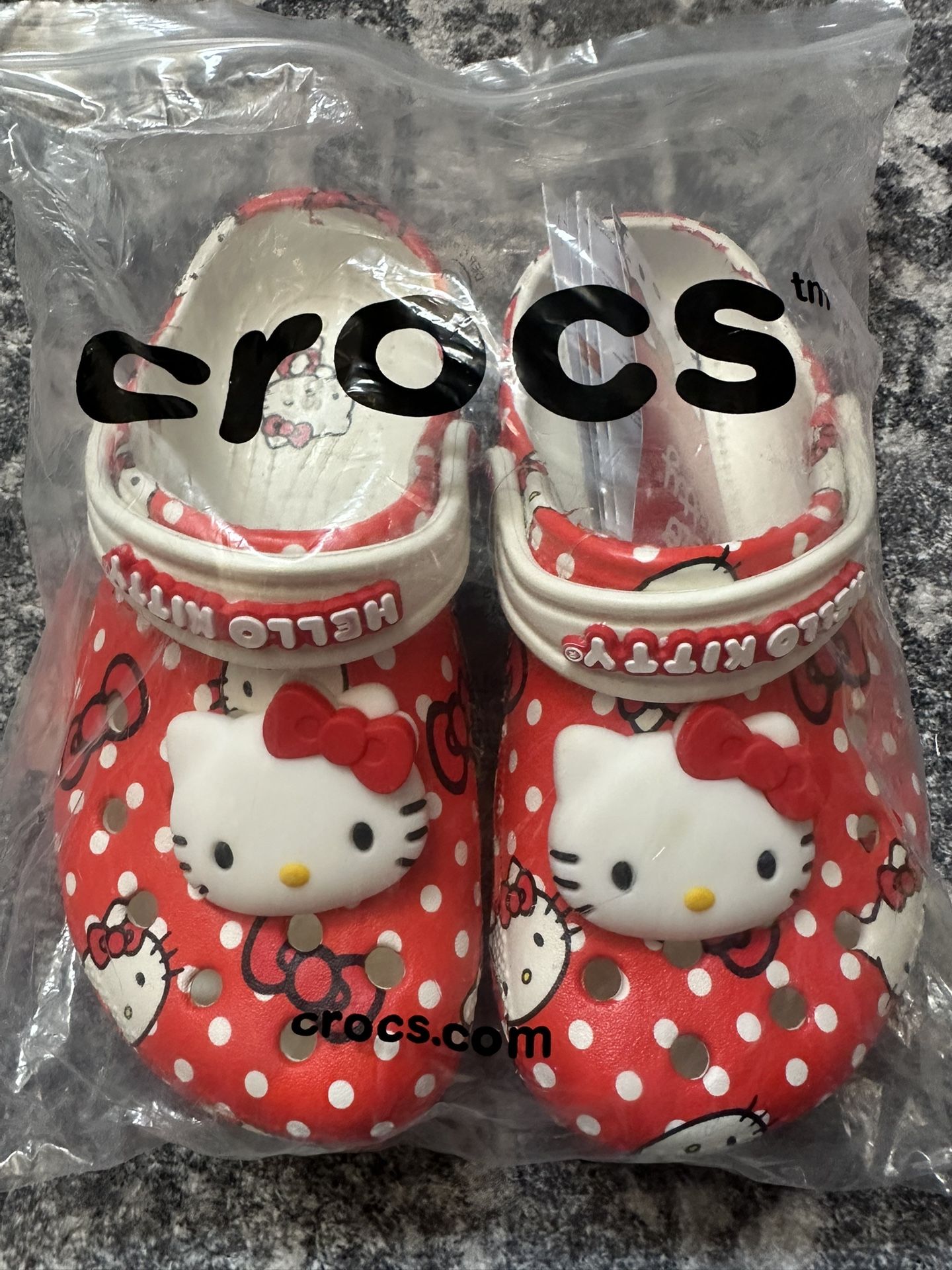 New in bag hello Kitty crocs size 12 kids//FREE CHARMS INCLUDED!