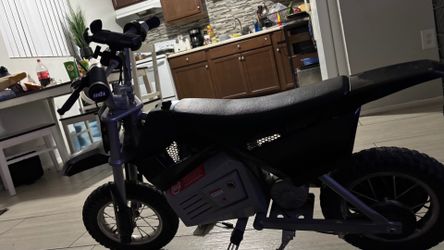 Razor mx 350 with odi grips and phone mount