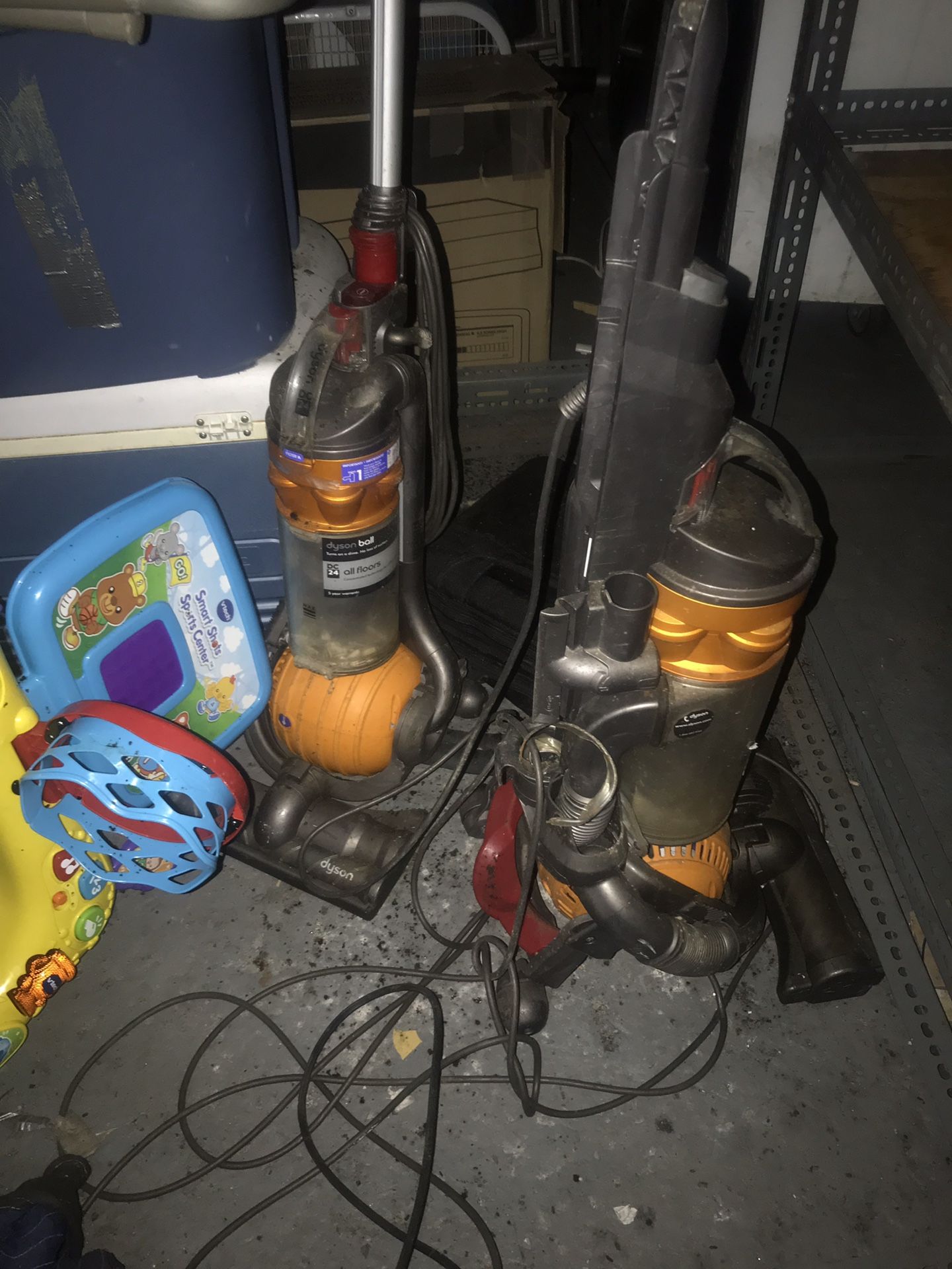 Two dyson dc 24 vacuums for sale, one for parts and one 100% working