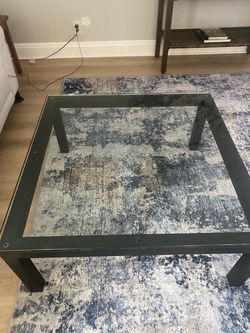 Living room, glass table top with metal frame