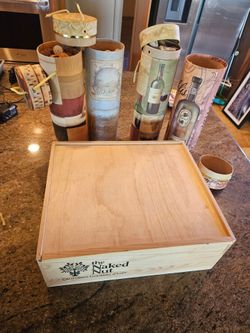 4 decorative wine tube carriers and the wooden box as a bundle