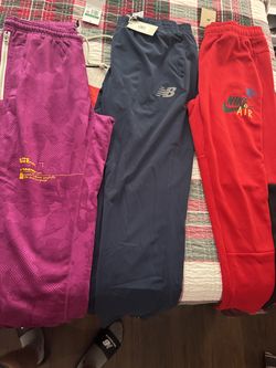 Nike and New Balance sweatpants