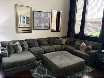 Large Charcoal Gray Sectional Sofa with Oversized Ottoman & Pillows – $600