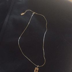 Sterling silver necklace and amethyst pendant. Pendant is .75", chain in 17 1/2 "